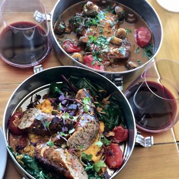 Niner Wine Estates - Pan-roasted chicken, mushrooms, smoked tomato velouté & Pork sausage with polenta and wilted greens - Wine Tasting Room Near Me - Paso Robles, California Niner Wine Estates - Pan-roasted chicken, mushrooms, smoked tomato velouté & Pork sausage with polenta and wilted greens - Wine Tasting Room Near Me - Paso Robles, California