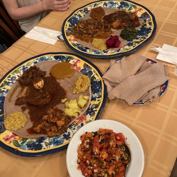 Hawwi Ethiopian Restaurant - 9. Timatim Salad, 23. Fish Goulash, 29. Veggi Mix Combo, and 33. Super Combo - Ethiopian Near Me - Alexandria, Virginia