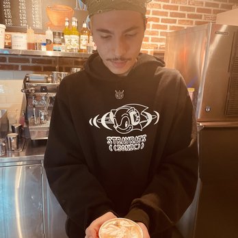 Misha’s Coffee - The barista and his latte art - Coffee & Tea Near Me - Alexandria, Virginia Misha’s Coffee - The barista and his latte art - Coffee & Tea Near Me - Alexandria, Virginia
