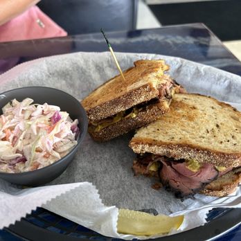 The Nosh Pit - Classic Pastrami w/slaw with a pickle spear - Delis Near Me - Saint Petersburg, Florida The Nosh Pit - Classic Pastrami w/slaw with a pickle spear - Delis Near Me - Saint Petersburg, Florida