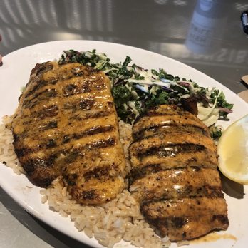 California Fish Grill - Salmon and Swai Combo Cajun Style....it was delicious. Kale slaw and brown rice. This place is really good!! - Seafood Near Me - San Diego, California