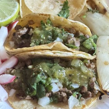 Taqueria Los Mexicanos - Tacos de carne asada comes with cilantro and onions, and a side of sliced radishes and grilled onions. - Mexican Near Me - Antioch, California Taqueria Los Mexicanos - Tacos de carne asada comes with cilantro and onions, and a side of sliced radishes and grilled onions. - Mexican Near Me - Antioch, California