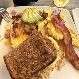 Meat lovers with sliced avocado on top. Side of bacon and scrambled eggs. Friendly staff Meat lovers with sliced avocado on top. Side of bacon and scrambled eggs. Friendly staff