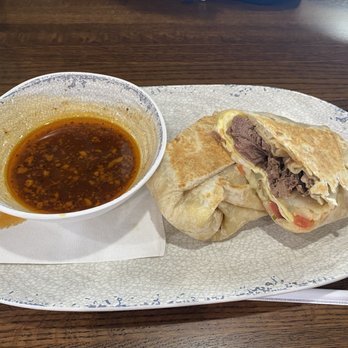 The Nest Egg Cafe - Birria breakfast burrito - Breakfast & Brunch Near Me - Allendale, Michigan