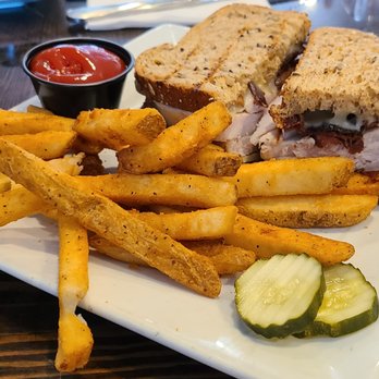 O'Slattery's Irish Restaurant & Pub - Dublin Gobbler - roasted turkey breast, cheddar, apple slices, cranberry mayo, on grilled multigrain bread. - Irish Near Me - Delmar, New York O'Slattery's Irish Restaurant & Pub - Dublin Gobbler - roasted turkey breast, cheddar, apple slices, cranberry mayo, on grilled multigrain bread. - Irish Near Me - Delmar, New York