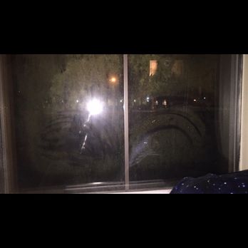 The Venue - Where someone tried to break into my apt. The streaks are the hand prints against the pollen - Apartments Near Me - Baton Rouge, Louisiana