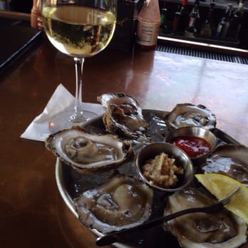 Half Shell Oyster House - Half a dozen oysters and a white to wash it down - Seafood Near Me - Biloxi, Mississippi Half Shell Oyster House - Half a dozen oysters and a white to wash it down - Seafood Near Me - Biloxi, Mississippi