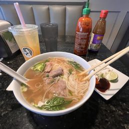 My pho large with rare steak and brisket and lychee green tea My pho large with rare steak and brisket and lychee green tea