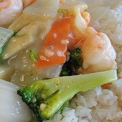 China House - Shrimp with mixed vegetables in a white sauce with white steamed rice.