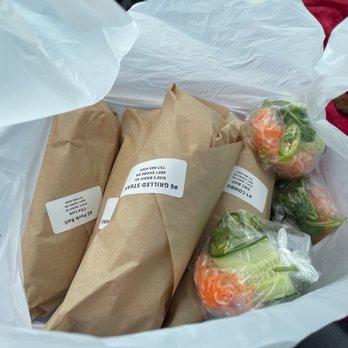 Kim's Banh Mi & More - 4 sandwiches with veggies to the side - Vietnamese Near Me - Virginia Beach, Virginia Kim's Banh Mi & More - 4 sandwiches with veggies to the side - Vietnamese Near Me - Virginia Beach, Virginia
