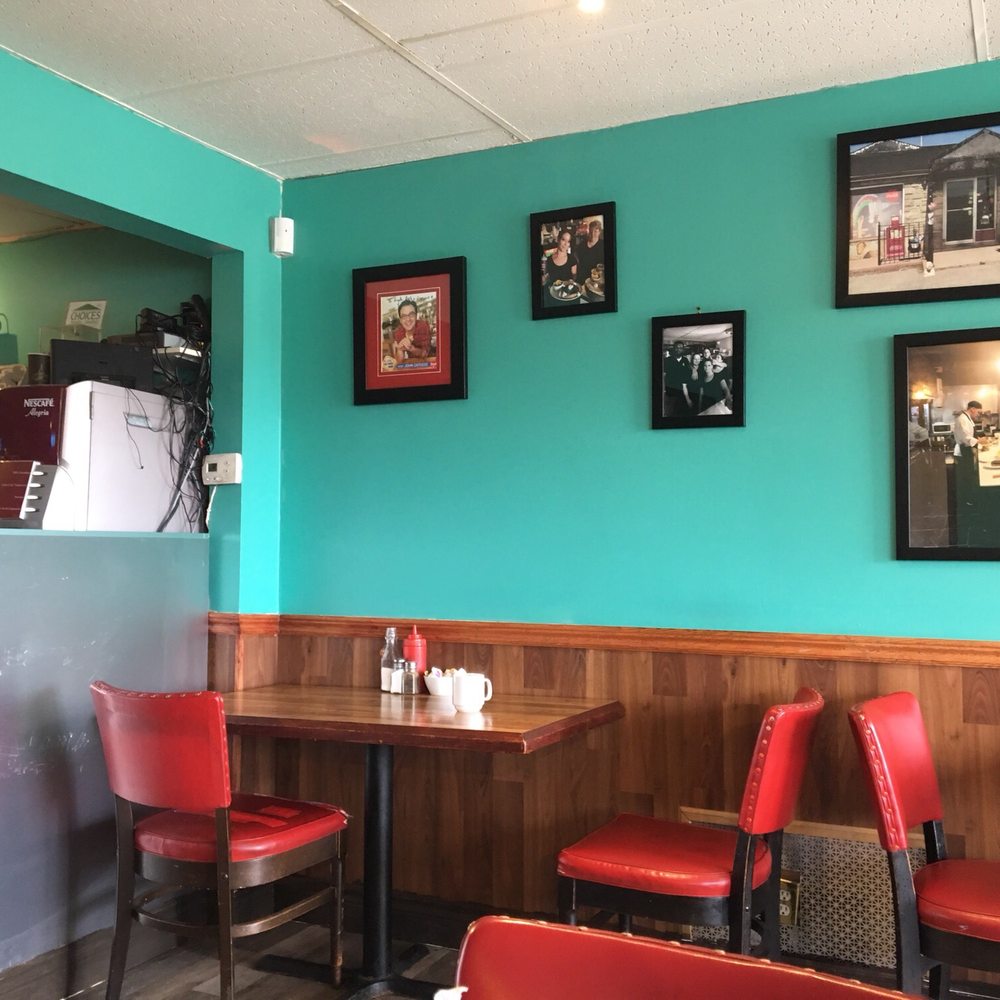 Barb's Country Kitchen - red chairs and a blue wall - Burgers Near Me - Orangeville, Ontario