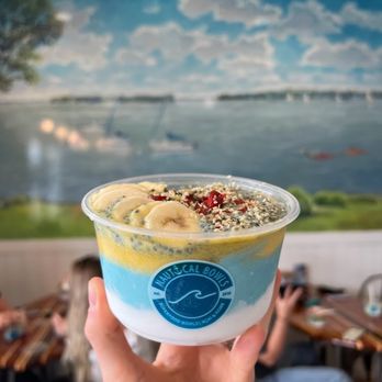 Nautical Bowls - BYO Dinghy Bowl (Coconut, blue majik, mango, and spirulina chia pudding bases, topped with banana, goi berries, hemp seeds) - Acai Bowls Near Me - Naperville, Illinois Nautical Bowls - BYO Dinghy Bowl (Coconut, blue majik, mango, and spirulina chia pudding bases, topped with banana, goi berries, hemp seeds) - Acai Bowls Near Me - Naperville, Illinois
