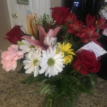 Bokay Florist - $75 worth of mixed-matched flowers. They were fresh, but not so lovely. Looks more like a grocery store bouquet plopped in a vase. - Florists Near Me - Rosenberg, Texas