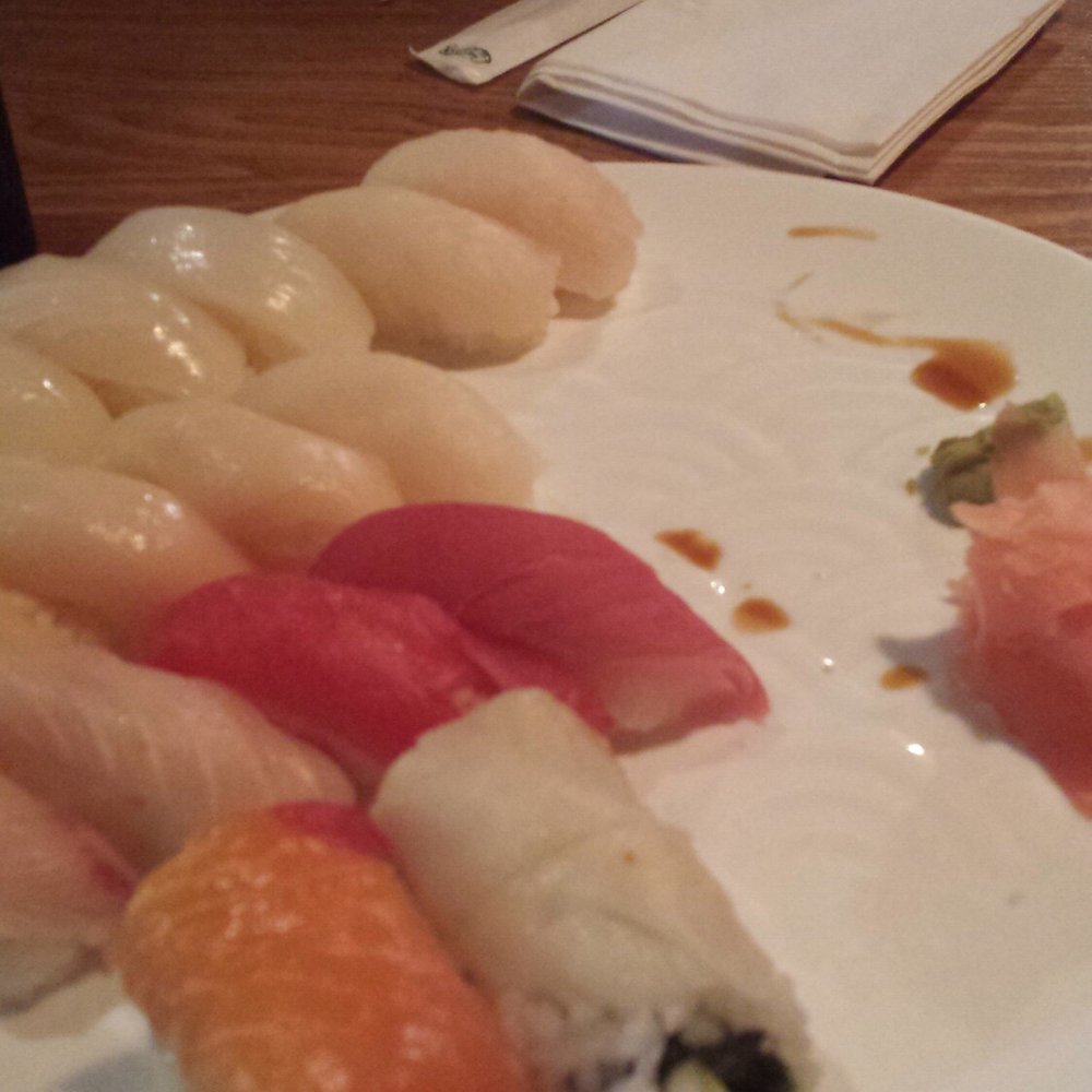 Sushi Ai - The last of a rainbow roll, tuna, white tuna, yellowtail, salmon nigiri. On the other plate, spicy tuna nigiri - Sushi Bars Near Me - O'Fallon, Missouri Sushi Ai - The last of a rainbow roll, tuna, white tuna, yellowtail, salmon nigiri. On the other plate, spicy tuna nigiri - Sushi Bars Near Me - O'Fallon, Missouri