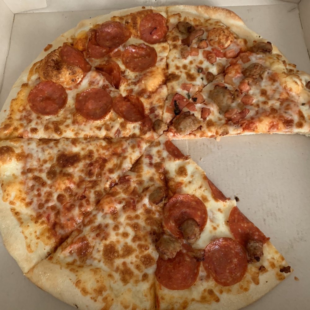 Little Caesars - Quattro pizza (minus a slice) - Pizza Near Me - Doraville, Georgia Little Caesars - Quattro pizza (minus a slice) - Pizza Near Me - Doraville, Georgia