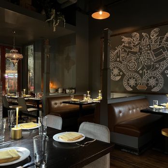 Pappe - a dining area with tables and chairs - Indian Near Me - Washington, DC, District of Columbia