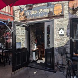 Exterior outside entrance of Le Pape Georges - Front of bar and restaurant - Quebec City, Quebec Exterior outside entrance of Le Pape Georges - Front of bar and restaurant - Quebec City, Quebec