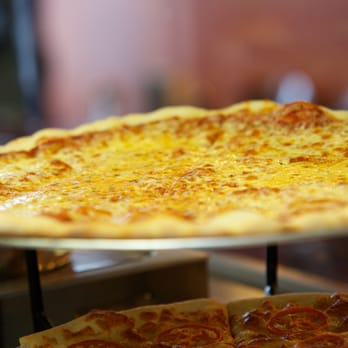 Brooklyn Pizza - a cheese pizza on a plate - Pizza Near Me - Denver, Colorado Brooklyn Pizza - a cheese pizza on a plate - Pizza Near Me - Denver, Colorado