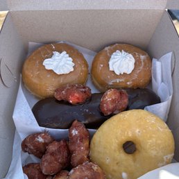 Blueberry and jelly filled, vanilla bean glazed, raspberry fritter bites, fudge bar Blueberry and jelly filled, vanilla bean glazed, raspberry fritter bites, fudge bar