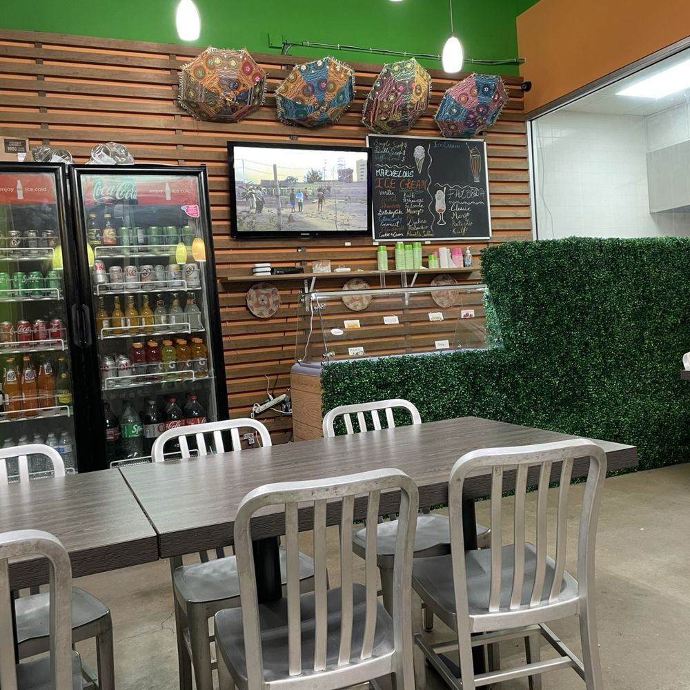 Promise Pizza - Dining area with drink cooler and ice cream - Pizza Near Me - Round Rock, Texas Promise Pizza - Dining area with drink cooler and ice cream - Pizza Near Me - Round Rock, Texas