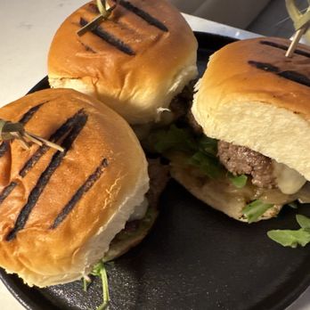 Bin 2004 - Sliders - American Wagyu, Muenster Cheese, Sauteed Onion, Arugula, Pickle, Smokey Aioli - New American Near Me - North Myrtle Beach, South Carolina Bin 2004 - Sliders - American Wagyu, Muenster Cheese, Sauteed Onion, Arugula, Pickle, Smokey Aioli - New American Near Me - North Myrtle Beach, South Carolina