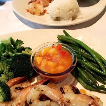 Bonefish Grill - Shrimp and scallops with mango salsa, string beans, and broccoli. Lobster stuffed shrimp in background - Seafood Near Me - Paramus, New Jersey