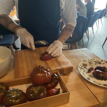 Rocca - Cutting the Heirloom Tomatoes - Italian Near Me - Tampa, Florida Rocca - Cutting the Heirloom Tomatoes - Italian Near Me - Tampa, Florida