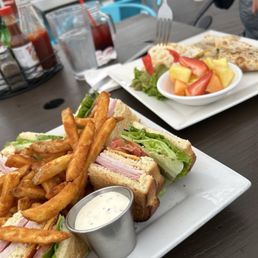 Club sandwich with French fries Club sandwich with French fries