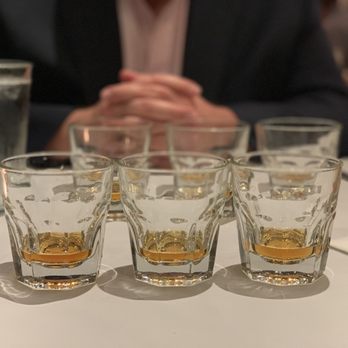 Ouisie's Table - Bourbon flight paired with dessert - New American Near Me - Houston, Texas