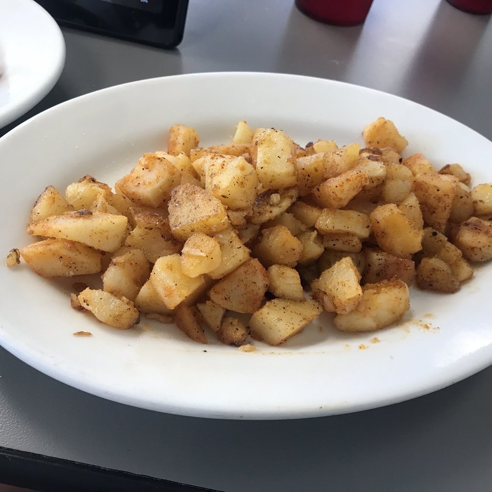 a plate of potatoes and bacon a plate of potatoes and bacon