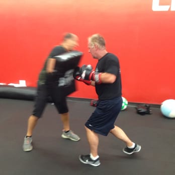 Crosscut Boxing - Louie "The Syrian" Hubela holding a bag for a member in one of our Sunday advanced classes, call us today for more information - Trainers Near Me - Matawan, New Jersey Crosscut Boxing - Louie "The Syrian" Hubela holding a bag for a member in one of our Sunday advanced classes, call us today for more information - Trainers Near Me - Matawan, New Jersey