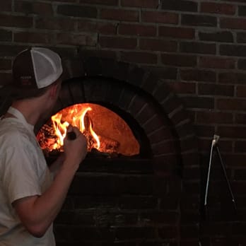 Pizzeria Seven Twelve - Jake manning the oven - Pizza Near Me - Orem, Utah Pizzeria Seven Twelve - Jake manning the oven - Pizza Near Me - Orem, Utah