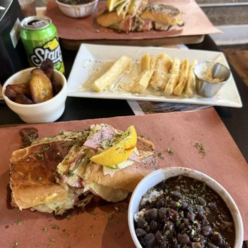 Havana 1961 - Papu's Cuban with Cuban Black Beans and Rice with a side of Maduro's and Yuca Fries. - Cuban Near Me - St. Peters, Missouri Havana 1961 - Papu's Cuban with Cuban Black Beans and Rice with a side of Maduro's and Yuca Fries. - Cuban Near Me - St. Peters, Missouri