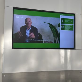Quest Diagnostics - Enlarged tv screen showing appointments and times. - Laboratory Testing Near Me - Apopka, Florida