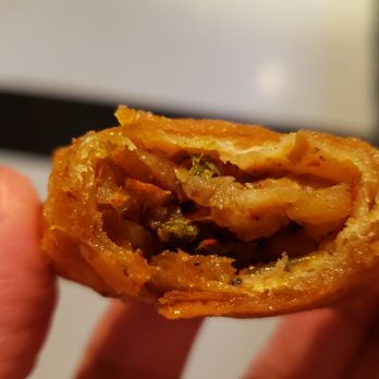 Dilla's - Interior of vegetable sambusa ($8). Oily with weird buttery flavor. - Ethiopian Near Me - Minneapolis, Minnesota