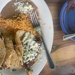 Poco Loco Cantina - Steak taco with rice and beans