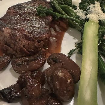 Carlyle - From the gluten free menu, 6  Filet Mignon with mushrooms and broccolini. - New American Near Me - Arlington, Virginia
