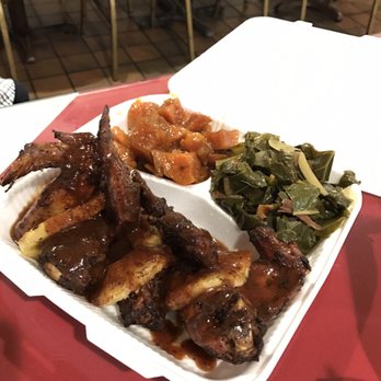 Rosako's Restaurant - Jerk chicken wings with yams and greens. Don't pass it up! - Soul Food Near Me - Bedford, Texas