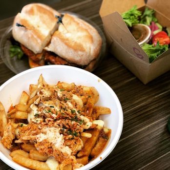 Hangry Chicken - a bowl of fries and a sandwich - Portuguese Near Me - Stoney Creek, Ontario Hangry Chicken - a bowl of fries and a sandwich - Portuguese Near Me - Stoney Creek, Ontario