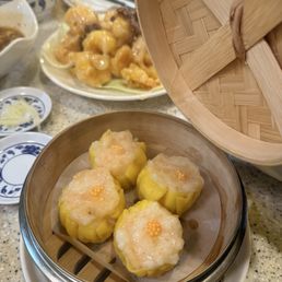 Shrimp & Pork Shumai, honey walnut shrimp in the back Shrimp & Pork Shumai, honey walnut shrimp in the back