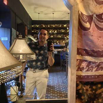 El Cubujon - Decor and myself on their mirror - Tapas Bars Near Me - San German, Puerto Rico