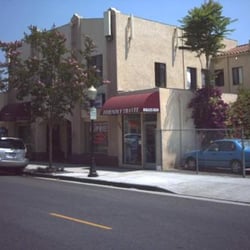 Friendly International Travel Service - Wider view of the storefront