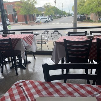 Bongiorno - a view of a restaurant with tables and chairs - Italian Near Me - Birmingham, Alabama