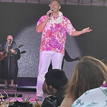 Ka Moana Luau - The emcee. Flower behind his right ear, guess he's available. - Performing Arts Near Me - Honolulu, Hawaii Ka Moana Luau - The emcee. Flower behind his right ear, guess he's available. - Performing Arts Near Me - Honolulu, Hawaii