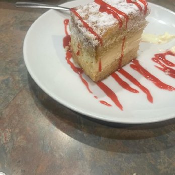 Flame & Skewer - Strawberry dessert. The absolute best EVER. So light and fluffy. - American Near Me - Ames, Iowa
