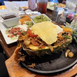 El Toro Loco Mexican Bar And Grill - Pineapple Fajitas.  Meats include shrimp, chicken and beef.  Enough for two