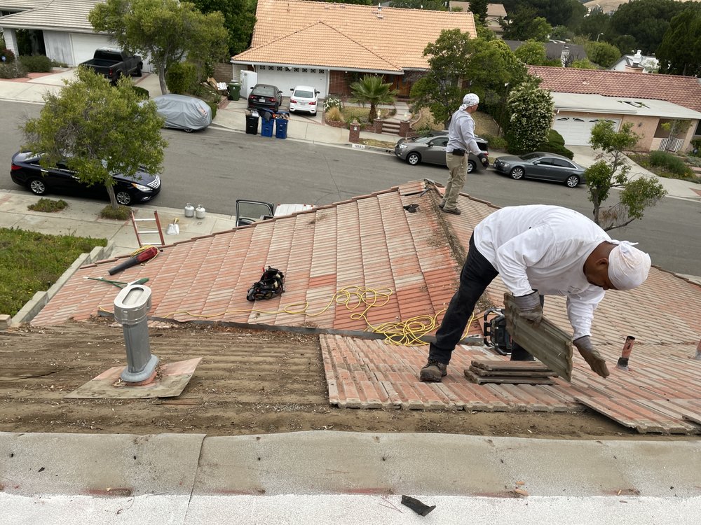 Slide of Roofing Contractors Inc