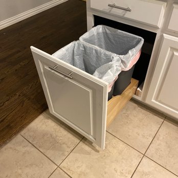 Infinite Luxury Renovations - a trash can in a cabinet - General Contractors Near Me Infinite Luxury Renovations - a trash can in a cabinet - General Contractors Near Me