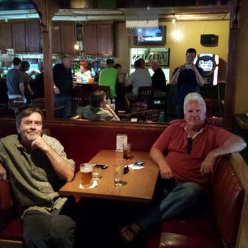The Biergarten - two men sitting at a table - Pubs Near Me - Dearborn, Michigan