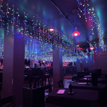 The Devil's Drink - Holiday lights and seating - Cocktail Bars Near Me - Denver, Colorado